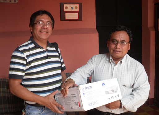 Our history with PLFM goes back to 2009 when we donated a digital projector for their use. PLFM president Ajpub’ García Ixmatá on the left, with PLFM Executive Director Andrés Cholotío García.