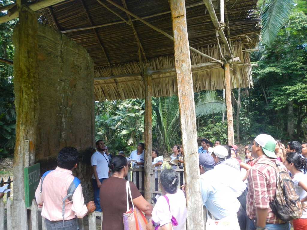 An explanation of Stela 1 during the visit to Ixkun.
