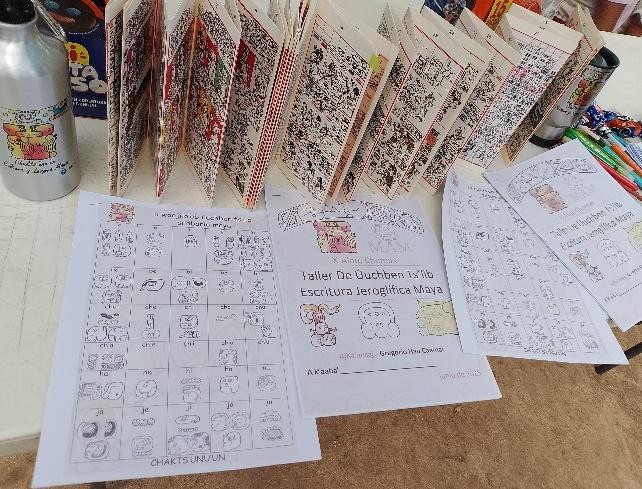 A group of books on a table

Description automatically generated